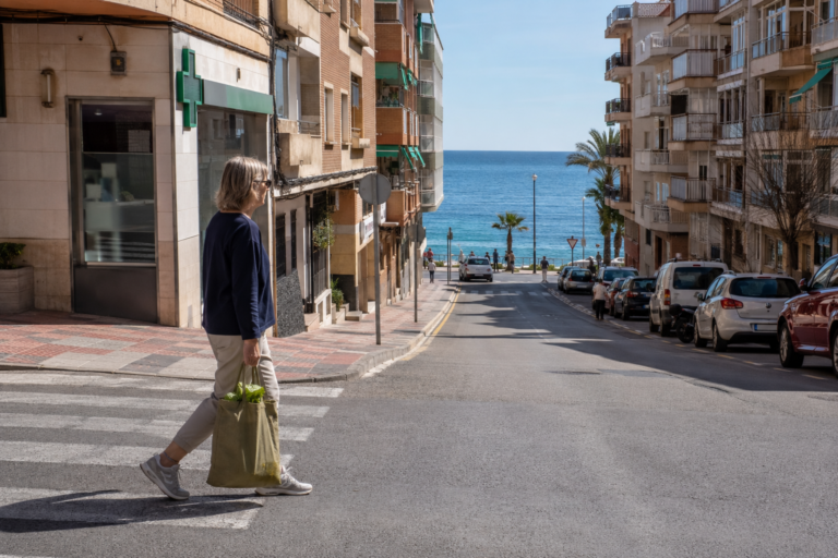 Property buyer testing a walking route between shops and the coast in Costa Blanca